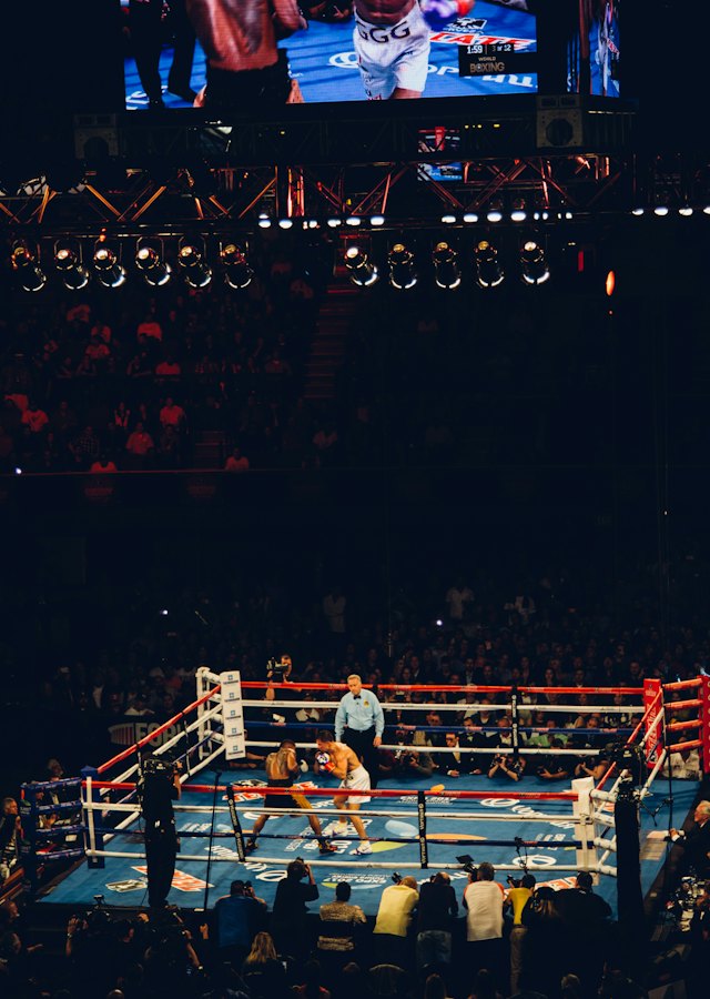 Boxing ring in a packed arena — PPV events on PrimeFlex Media